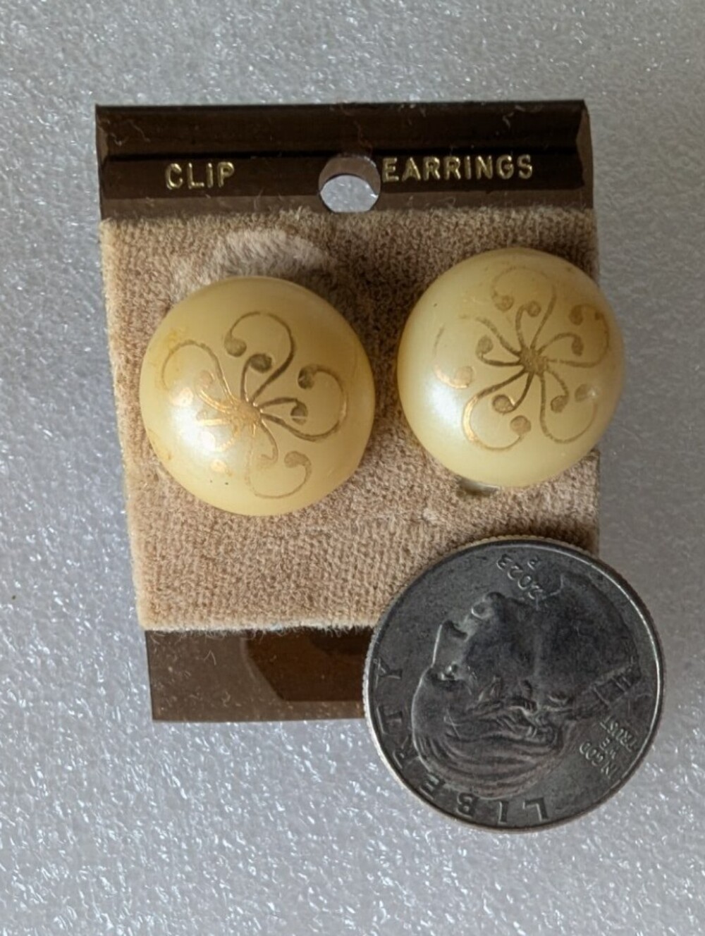 Vintage Round Cream Clip-On Earrings with Gold Scroll Motif